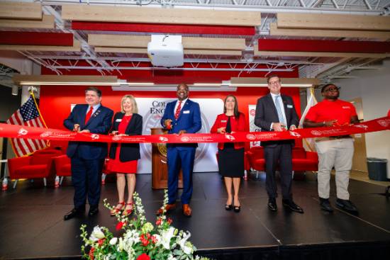 From left, Illinois Gov. JB Pritzker, Board of Trustees Chairperson Kathy Bohn '74, M.S. '80, President Aondover Tarhule, Provost Ani Yazedjian, College of Engineering Dean Tom Keyser, and student Edisson Charles cut a ribbon to dedicate Illinois State University's College of Engineering. 