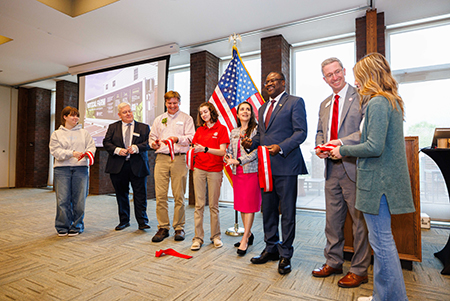 Several leaders cut the ceremonial ribbon for the Vertical Farm at Illinois State University