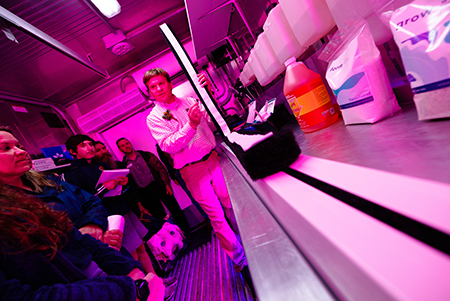 Dr. David Kopsell leads a tour, showcasing tools within the Vertical Farm at Illinois State University.