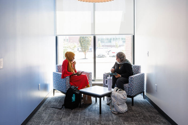 Two students study together.