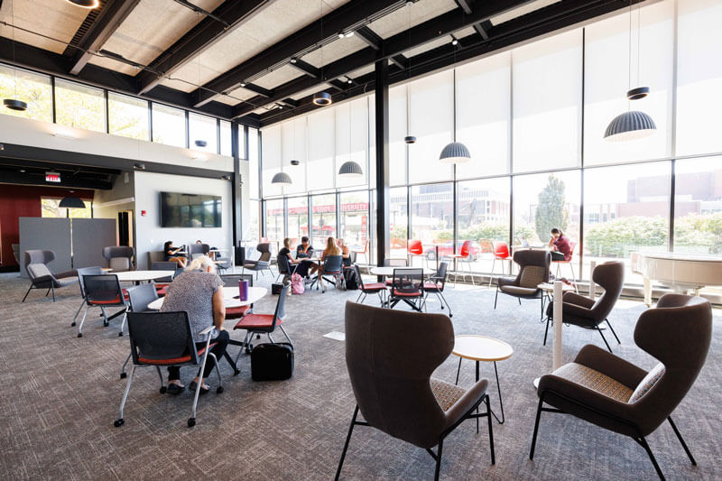 Students study in the lounge of the simulation center.